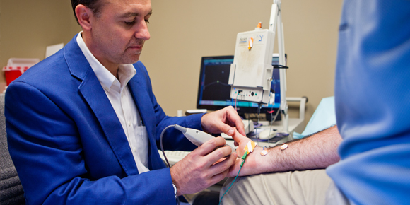 Dr performing a test.